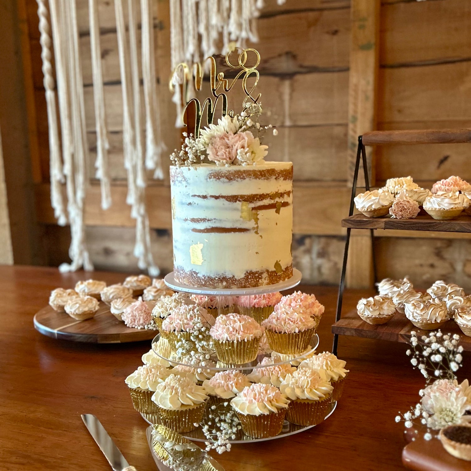 Wedding cake, cupcakes and assorted mini tarts